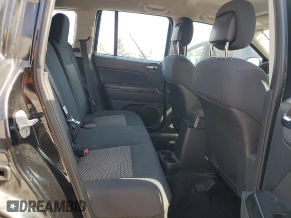 2010 Jeep Compass Sport with VIN 1J4NF4FB2AD591523, listed as a Copart auction lot 48809775 with 105,720 mi miles and Salvage Title. Bid and sale history available at carsss.com. Image 11.
