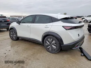 2024 Nissan ARIYA Evolve+ with VIN JN1DF0BB1RM738901, listed as a Copart auction lot 55597295 with 6,569 mi miles and Salvage title. Bid and sale history available at DreamBid. Image 2.