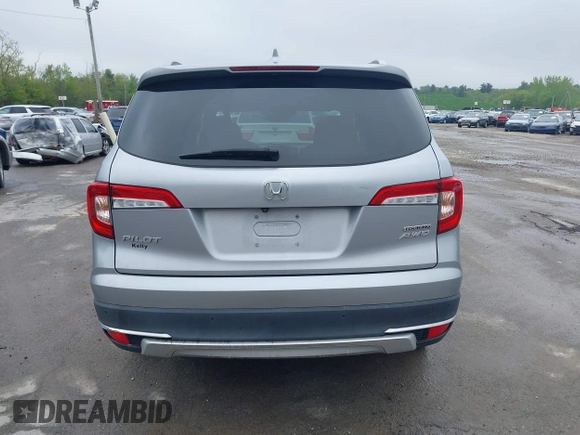 2020 Honda Pilot Touring 8-Passenger z VIN 5FNYF6H91LB042626, wystawiony jako IAAI lot #42249440 z przebiegiem 57 429 mil mil oraz . Historia ofert i sprzedaży dostępna na DreamBid. Obrazek 16.