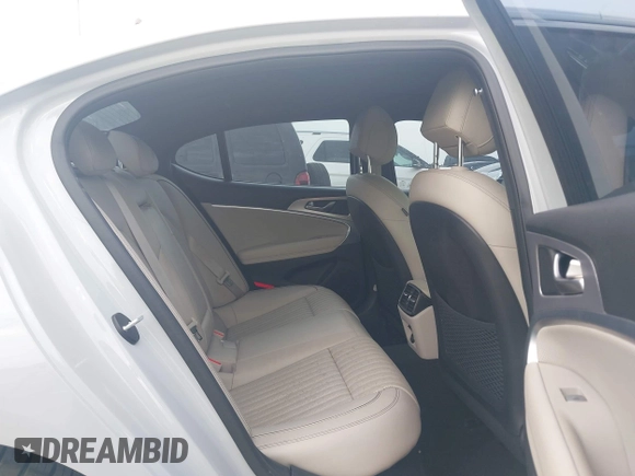 2022 Genesis G70 2.0T with VIN KMTG34TA9NU090218, listed as a IAAI auction lot 42437863 with 18,913 mi miles and . Bid and sale history available at DreamBid. Image 8.