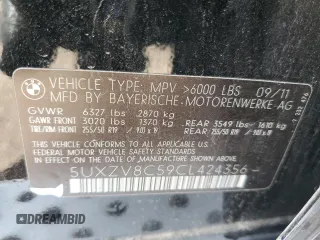 2012 BMW X5 50i with VIN 5UXZV8C59CL424356, listed as a Copart auction lot 54763725 with 107,712 mi miles and Salvage title. Bid and sale history available at DreamBid. Image 14.