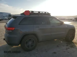 2020 Jeep Grand Cherokee Trailhawk with VIN 1C4RJFLT9LC430514, listed as a Copart auction lot 85311924 with 170,554 mi miles and Salvage title. Bid and sale history available at DreamBid. Image 3.