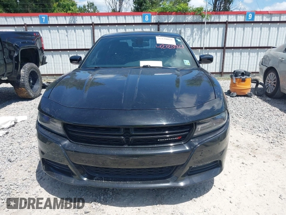 2015 Dodge Charger SXT with VIN 2C3CDXHG2FH852208, listed as a IAAI auction lot 42120021 with 156,486 mi miles and . Bid and sale history available at DreamBid. Image 12.