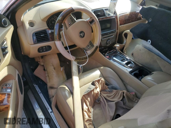 2009 Jaguar XK with VIN SAJWA43B995B30780, listed as a Copart auction lot 79119264 with 0 mi miles and Salvage Title. Bid and sale history available at carsss.com. Image 8.