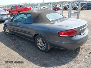 2004 Chrysler Sebring LXi z VIN 1C3EL55R54N391404, wystawiony jako IAAI lot #42051873 z przebiegiem 126 918 mil mil oraz . Historia ofert i sprzedaży dostępna na DreamBid. Obrazek 3.