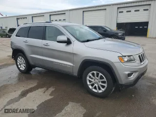 2014 Jeep Grand Cherokee Laredo with VIN 1C4RJEAG8EC393569, listed as a Copart auction lot 49244895 with 151,998 mi miles and Salvage Title. Bid and sale history available at carsss.com. Image 4.