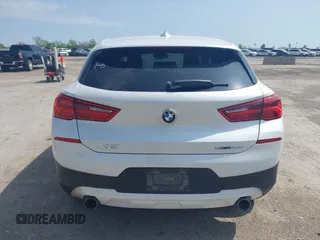 2018 BMW X2 sDrive28i z VIN WBXYJ3C39JEJ82408, wystawiony jako IAAI lot #41919498 z przebiegiem 121 403 mil mil oraz . Historia ofert i sprzedaży dostępna na DreamBid. Obrazek 16.