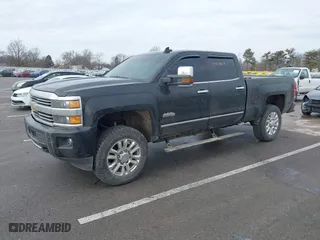 2015 Chevrolet Silverado 2500HD Built After Aug 14 High Country with VIN 1GC1KXE84FF536963, listed as a IAAI auction lot 41439878 with 191,471 mi miles. Bid and sale history available at carsss.com. Image 2.