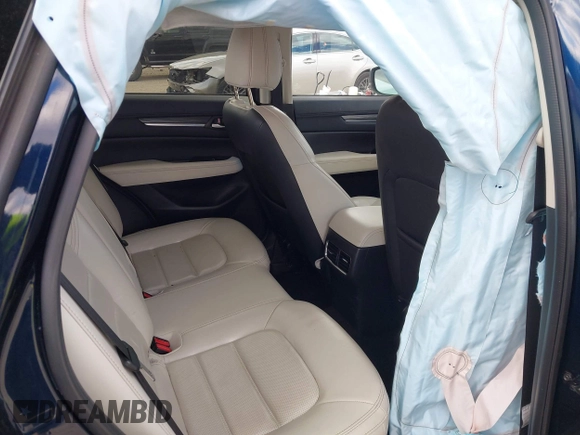 2019 Mazda CX-5 Grand Touring with VIN JM3KFBDM2K0603400, listed as a IAAI auction lot 42051135 with 59,448 mi miles and . Bid and sale history available at DreamBid. Image 8.
