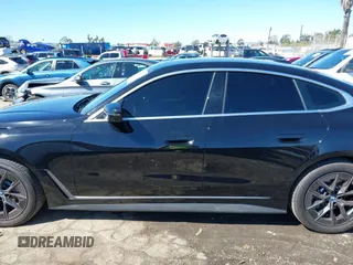 2024 BMW i4 eDrive35 z VIN WBY43AW01RFS94328, wystawiony jako IAAI lot #41734039 z przebiegiem 8959 mil mil oraz . Historia ofert i sprzedaży dostępna na DreamBid. Obrazek 15.