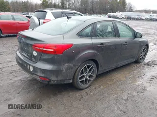 2017 Ford Focus SEL with VIN 1FADP3H28HL297474, listed as a IAAI auction lot 41738873 with 39,677 mi miles. Bid and sale history available at carsss.com. Image 4.
