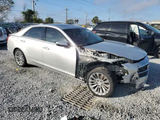 2016 Cadillac CTS Luxury Collection AWD with VIN 1G6AX5SX4G0101062, listed as a Copart auction lot 45140335 with 77,591 mi miles and Salvage Title. Bid and sale history available at DreamBid. Image 4.