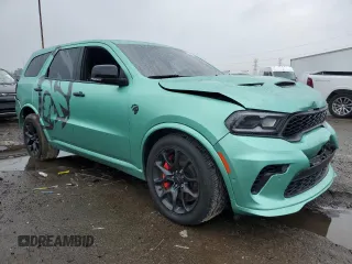 2021 Dodge Durango SRT Hellcat with VIN 1C4SDJH94MC626645, listed as a Copart auction lot 59998915 with 61,323 mi miles and Clean title. Bid and sale history available at DreamBid. Image 4.