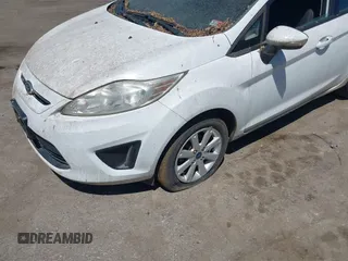 2013 Ford Fiesta SE with VIN 3FADP4EJ0DM109816, listed as a IAAI auction lot 42119360 with 164,397 mi miles and . Bid and sale history available at DreamBid. Image 6.