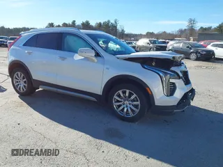 2022 Cadillac XT4 AWD Premium Luxury with VIN 1GYFZDR41NF105299, listed as a IAAI auction lot 41257154 with 34,904 mi miles and . Bid and sale history available at carsss.com. Image 1.