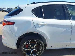 2023 Alfa Romeo Stelvio Ti with VIN ZASPAKBN4P7D63524, listed as a IAAI auction lot 41626631 with 37,731 mi miles. Bid and sale history available at carsss.com. Image 22.