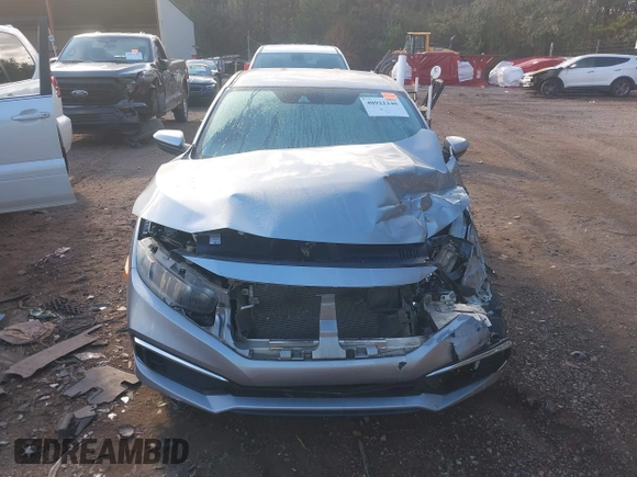 2020 Honda Civic LX z VIN 2HGFC2F60LH549739, wystawiony jako IAAI lot #40922240 z przebiegiem 127 958 mil mil oraz . Historia ofert i sprzedaży dostępna na DreamBid. Obrazek 12.
