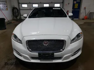 2015 Jaguar XJ with VIN SAJWJ1CD3F8V89374, listed as a Copart auction lot 49416114 with 94,636 mi miles and . Bid and sale history available at DreamBid. Image 5.