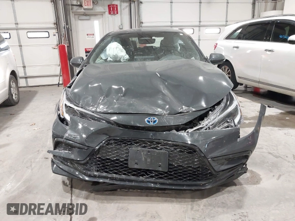 2023 Toyota Corolla Hybrid LE with VIN JTDBCMFE7P3021639, listed as a IAAI auction lot 41026783 with 38,656 mi miles. Bid and sale history available at carsss.com. Image 12.