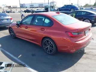 2021 BMW 3 Series 330i with VIN 3MW5R1J02M8B52337, listed as a IAAI auction lot 41610136 with 1 mi miles. Bid and sale history available at carsss.com. Image 3.