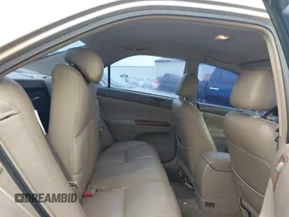 2002 Toyota Camry LE z VIN 4T1BE32K42U592181, wystawiony jako IAAI lot #42206721 z przebiegiem 299 947 mil mil oraz . Historia ofert i sprzedaży dostępna na DreamBid. Obrazek 8.
