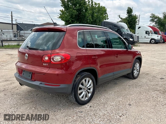 2011 Volkswagen Tiguan SEL with VIN WVGAV7AX1BW000384, listed as a Copart auction lot 59420805 with 166,245 mi miles and Clean title. Bid and sale history available at DreamBid. Image 4.