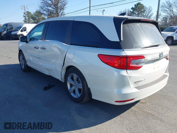 2018 Honda Odyssey EX-L z VIN 5FNRL6H79JB014419, wystawiony jako IAAI lot #41654269 z przebiegiem 84 372 mil mil oraz . Historia ofert i sprzedaży dostępna na DreamBid. Obrazek 3.
