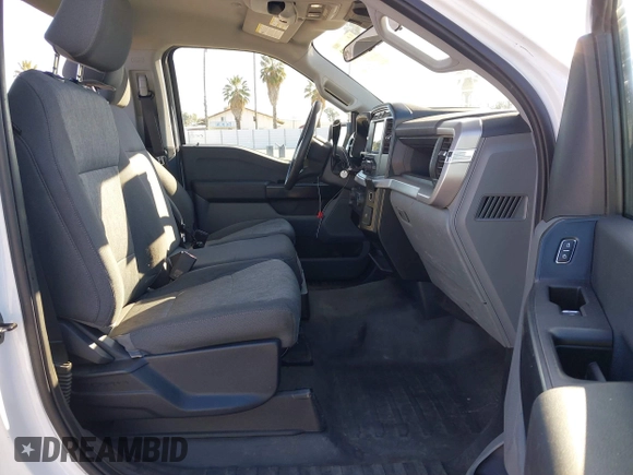 2023 Ford F-150 XL with VIN 1FTMF1C51PKD58283, listed as a IAAI auction lot 41752279 with 90,263 mi miles and . Bid and sale history available at carsss.com. Image 5.