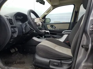 2007 Mercury Mariner Luxury with VIN 4M2YU91107KJ07772, listed as a Copart auction lot 42867545 with 128,235 mi miles and Salvage title. Bid and sale history available at DreamBid. Image 7.