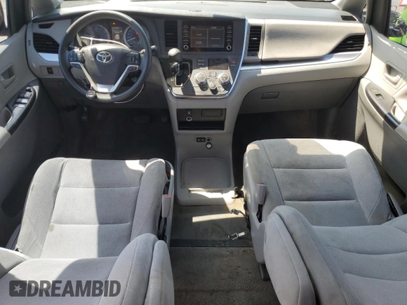 2018 Toyota Sienna L with VIN 5TDZZ3DCXJS928724, listed as a Copart auction lot 58067154 with 233,628 mi miles and Salvage Title. Bid and sale history available at DreamBid. Image 8.