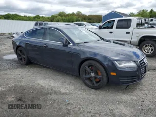 2012 Audi A7 z VIN WAUSGCFC8CN002171, wystawiony jako Copart lot #58473235 z przebiegiem 178 968 mil mil oraz Czysty tytuł • Clean title. Historia ofert i sprzedaży dostępna na DreamBid. Obrazek 4.