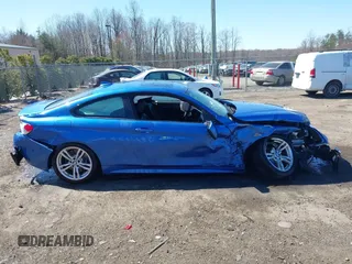 2014 BMW 4 Series 428i xDrive z VIN WBA3N5C50EF715770, wystawiony jako IAAI lot #41803713 z przebiegiem 77 602 mil mil oraz . Historia ofert i sprzedaży dostępna na DreamBid. Obrazek 13.