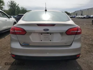 2017 Ford Focus SE z VIN 1FADP3F24HL291870, wystawiony jako Copart lot #60851275 z przebiegiem 83 334 mil mil oraz Szkoda całkowita • Salvage title. Historia ofert i sprzedaży dostępna na DreamBid. Obrazek 6.