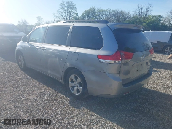2013 Toyota Sienna LE AAS with VIN 5TDKK3DCXDS369976, listed as a IAAI auction lot 42161009 with 183,408 mi miles. Bid and sale history available at carsss.com. Image 3.