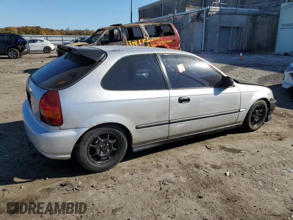 1998 Honda Civic CX with VIN 2HGEJ6325WH112575, listed as a Copart auction lot 77186644 with 147,976 mi miles and Salvage Title. Bid and sale history available at carsss.com. Image 3.