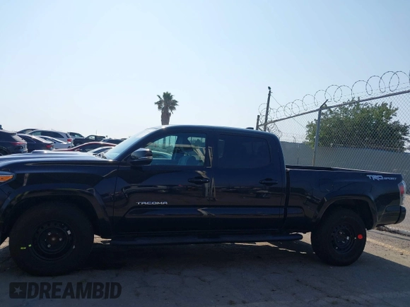 2022 Toyota Tacoma SR5 with VIN 3TMBZ5DN6NM034630, listed as a IAAI auction lot 42733932 with 43,309 mi miles and . Bid and sale history available at DreamBid. Image 14.