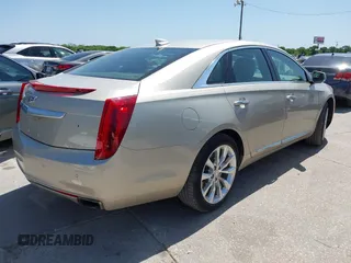 2016 Cadillac XTS Luxury Collection with VIN 2G61M5S31G9146455, listed as a IAAI auction lot 42019234 with 72,019 mi miles. Bid and sale history available at carsss.com. Image 4.