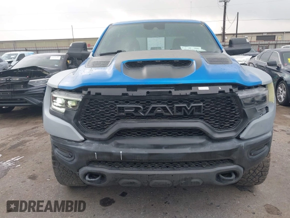 2021 Ram 1500 TRX with VIN 1C6SRFU91MN790158, listed as a IAAI auction lot 42115253 with 30,969 mi miles and . Bid and sale history available at DreamBid. Image 12.
