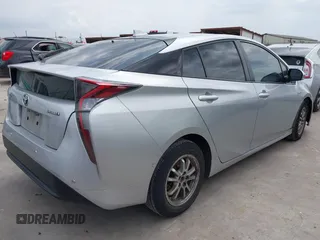 2016 Toyota Prius Four z VIN JTDKARFU5G3008768, wystawiony jako IAAI lot #42125504 z przebiegiem 164 229 mil mil oraz . Historia ofert i sprzedaży dostępna na DreamBid. Obrazek 4.