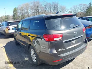 2017 Kia Sedona LX with VIN KNDMB5C14H6329340, listed as a IAAI auction lot 41803814 with 106,672 mi miles. Bid and sale history available at carsss.com. Image 3.