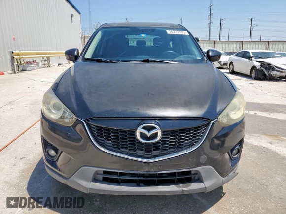 2014 Mazda CX-5 Touring with VIN JM3KE2CY5E0316077, listed as a Copart auction lot 58218735 with 190,789 mi miles and Salvage title. Bid and sale history available at DreamBid. Image 5.
