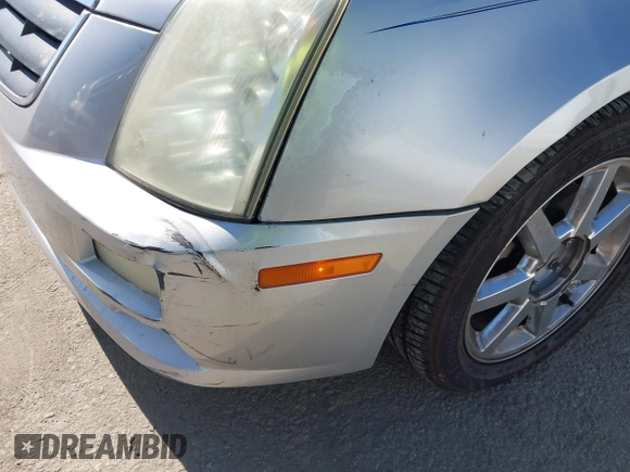 2005 Cadillac STS z VIN 1G6DW677350224198, wystawiony jako IAAI lot #42321639 z przebiegiem 122 208 mil mil oraz . Historia ofert i sprzedaży dostępna na DreamBid. Obrazek 20.