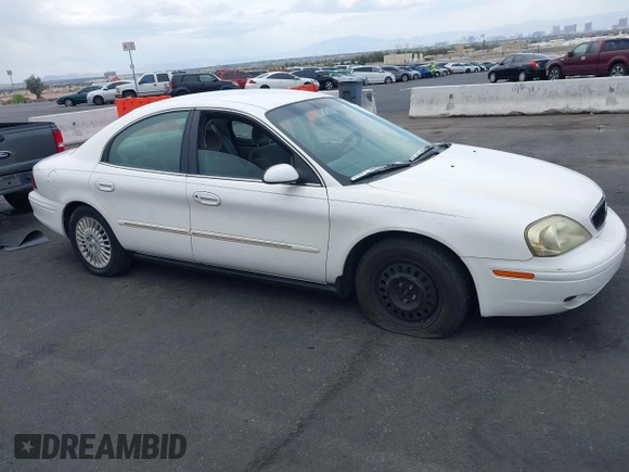 2002 Mercury Sable GS z VIN 1MEFM50U12G628060, wystawiony jako IAAI lot #42072436 z przebiegiem 139 336 mil mil oraz . Historia ofert i sprzedaży dostępna na DreamBid. Obrazek 13.