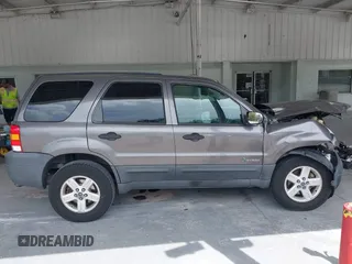 2005 Ford Escape Hybrid with VIN 1FMCU95HX5KD54412, listed as a IAAI auction lot 42115468 with 151,922 mi miles and . Bid and sale history available at DreamBid. Image 13.