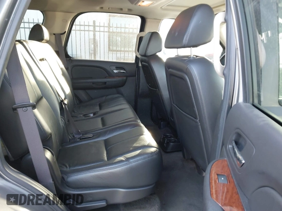 2008 GMC Yukon SLT w/4SB with VIN 1GKFK13078R227526, listed as a IAAI auction lot 41830004 with 143,728 mi miles. Bid and sale history available at carsss.com. Image 8.