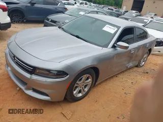 2015 Dodge Charger SE z VIN 2C3CDXBGXFH812970, wystawiony jako IAAI lot #42302350 z przebiegiem 204 107 mil mil oraz . Historia ofert i sprzedaży dostępna na DreamBid. Obrazek 2.