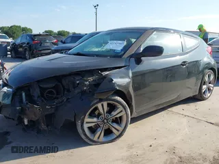 2013 Hyundai Veloster w/Black Int with VIN KMHTC6AD2DU171044, listed as a IAAI auction lot 42245907 with 140,542 mi miles and . Bid and sale history available at DreamBid. Image 2.