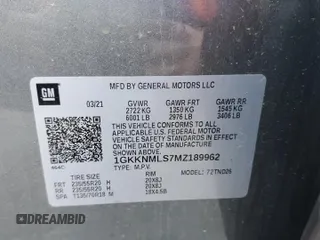 2021 GMC Acadia SLT z VIN 1GKKNMLS7MZ189962, wystawiony jako Copart lot #52797795 z przebiegiem 52 860 mil mil oraz Szkoda całkowita • Salvage title. Historia ofert i sprzedaży dostępna na DreamBid. Obrazek 13.