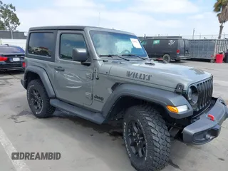 2022 Jeep Wrangler Sport S z VIN 1C4GJXAN2NW176325, wystawiony jako IAAI lot #42168112 z przebiegiem 18 004 mil mil oraz . Historia ofert i sprzedaży dostępna na DreamBid. Obrazek 1.