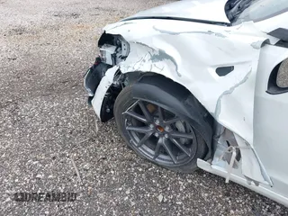 2023 Tesla Model 3 z VIN 5YJ3E1EA0PF608506, wystawiony jako IAAI lot #41748862 z przebiegiem 15 mil mil oraz . Historia ofert i sprzedaży dostępna na DreamBid. Obrazek 21.